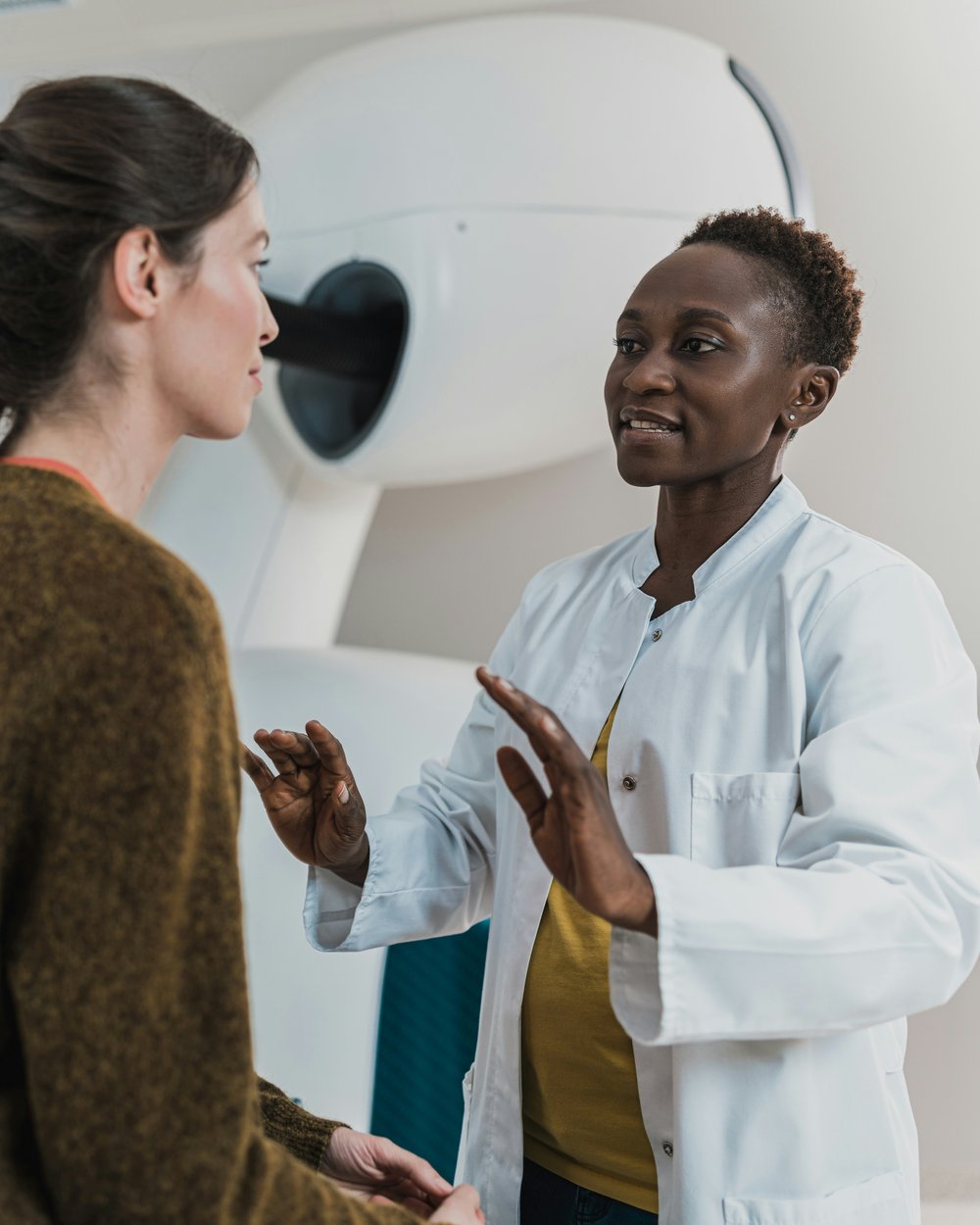 Physician explaining a procedure to a patient