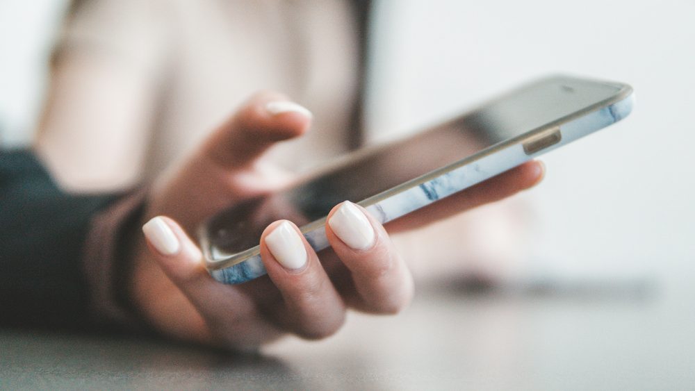 Patient checking their phone
